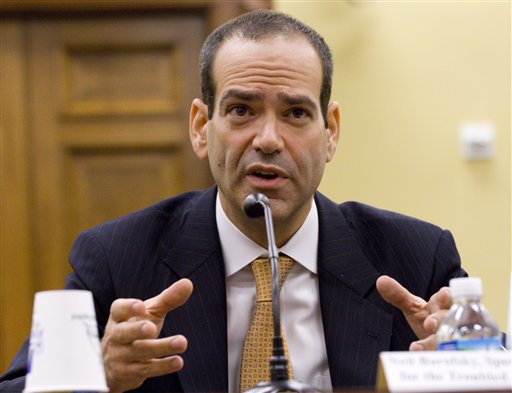 FILE - In this April 22, 2010 file photo, Neil Barofsky, Special Inspector General for the Troubled Asset Relief Program testifies before the House Appropriations Subcommittee on Financial Services and General Government on the Financial Crisis and TARP program on Capitol Hill in Washington. Barofsky says in a report released Tuesday, Jan. 25, 2011, that recent comments by Treasury Secretary Timothy Geithner and other top regulators suggest the government would rescue banks if one of them threatened the broader financial system. (AP Photo/Harry Hamburg, File) (AP)