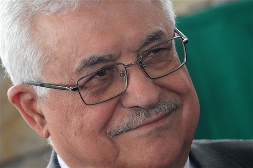 Palestinian President Mahmoud Abbas looks on during a ceremony to set the corner stone of the future Palestinian Embassy in Brasilia, Brazil, Friday, Dec. 31, 2010. Abbas is on a three-day official visit to Brazil. (AP Photo/Eraldo Peres). (AP)