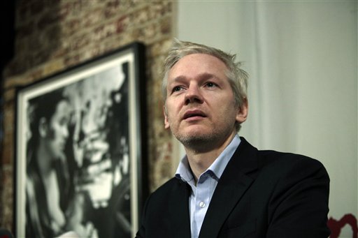 File - WikiLeaks founder Julian Assange, answers a reporter's question during a joint news conference with Rudolf Elmer, not seen, at the Frontline Club in London, in this Monday Jan. 17, 2011 file photo.   Assange returns to a British court Monday Feb. 7 2011,  to fight extradition to Sweden, where the WikiLeaks founder is wanted for questioning about alleged sex crimes. The 39-year-old Australian has denied the accusations, which his supporters claim are part of a CIA-led conspiracy against his secret-spilling organization. (AP Photo / Lefteris Pitarakis, file) (AP)