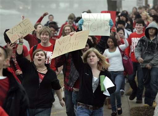 Appleton West High School students protest in support of their teachers on Thursday, Feb. 17, 2011.  Teachers and labor supporters swarmed entrances to the Senate chambers at the Wisconsin Capitol Thursday in an attempt to stop lawmakers from passing a bill that would strip most public employees of nearly all collective bargaining rights.  Senators were considering Republican Gov. Scott Walker's bill to end collective bargaining, except on issues of salary, for most public employees.  (AP Photo/The Post-Crescent,  Sharon Cekada) (AP)