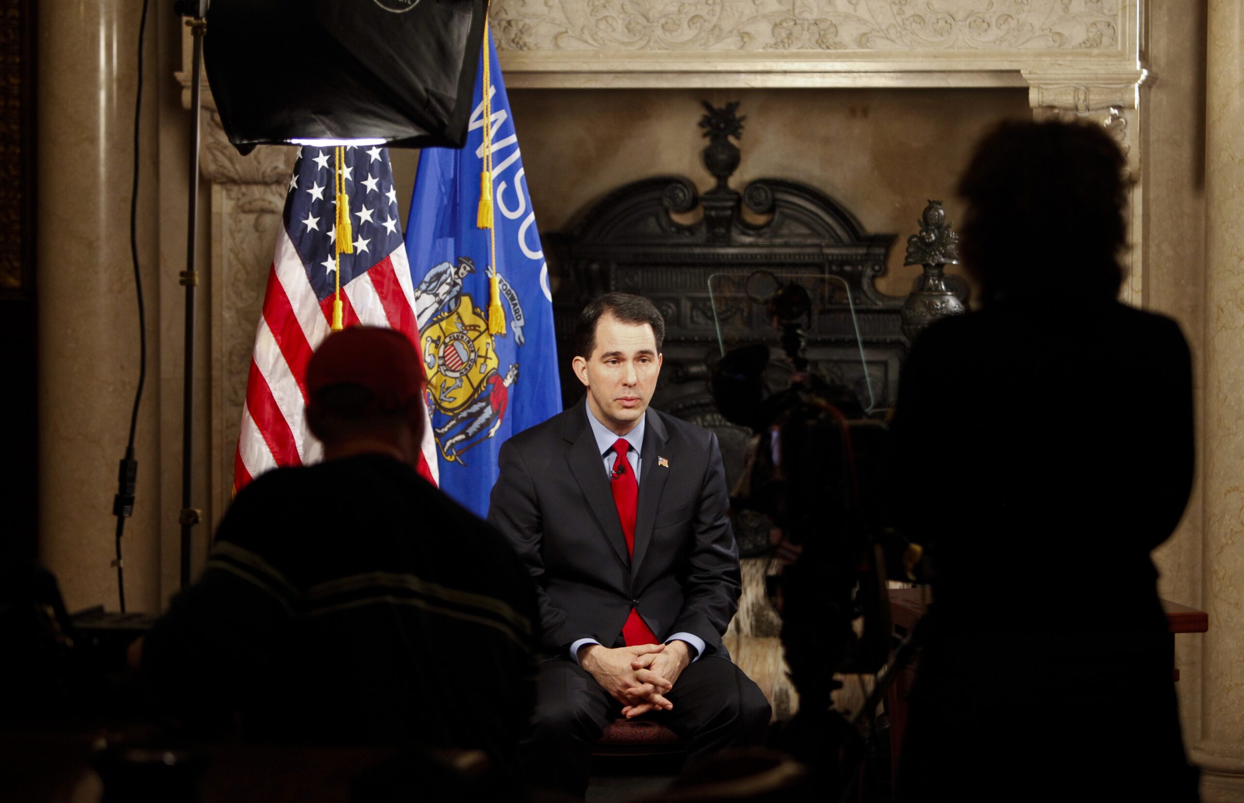 Wisconsin Gov. Scott Walker rehearses his fireside speech at the state Capitol in Madison, Wis., Tuesday, Feb. 22, 2011. Opponents to the governor's bill to eliminate collective bargaining rights for many state workers are in their eighth day of large scale protests. (AP Photo/Andy Manis) (Andy Manis)