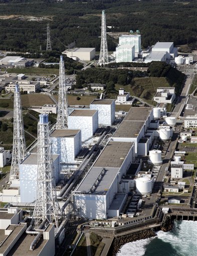 In this Oct. 3, 2008 photo, six reactors of the Fukushima Daiichi Nuclear Power Plant stand in line intact in Okumamachi in Fukushima Prefecture (state), northeastern Japan. Reactors, from bottom left, are: Unit 4, Unit 3, Unit 2, Unit 1, Unit 5 and Unit 6, top. (AP Photo/Kyodo News)  JAPAN OUT, MANDATORY CREDIT, NO LICENSING ALLOWED IN CHINA, HONG  KONG, JAPAN, SOUTH KOREA AND FRANCE (AP)