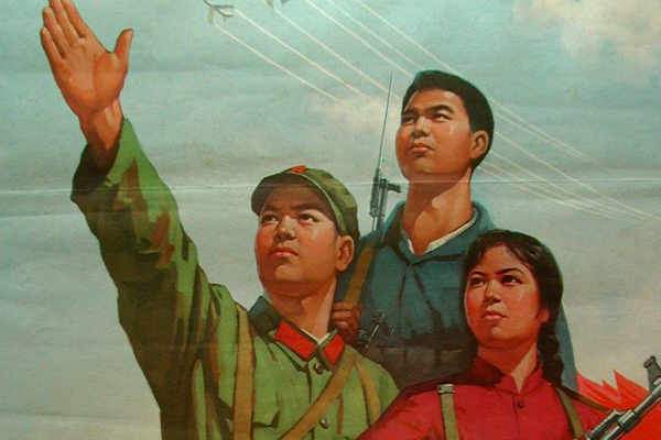 A PLA soldier instructing the citizen militia to defend against nuclear, chemical and biological attack.