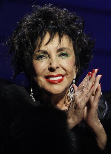 FILE - In this Thursday, Sept. 25, 2008 file photo, Elizabeth Taylor speaks during the 26th Annual Macy's Passport to Fashion gala in Santa Monica, Calif. Elizabeth Taylor has been admitted to a Los Angeles hospital and is being treated for symptoms caused by congestive heart failure, according to her spokeswoman, Friday, Feb. 11, 2011.  (AP Photo/Matt Sayles, File) (AP)