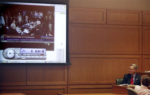 From the witness stand, Wisconsin Rep. Peter Barca (D-Kenosha) watches WisconsinEye Public Affairs Network footage  of the March 9, 2011 Joint Committee of Conference entered into evidence during a hearing before Dane County Circuit Judge Maryann Sumi at the Dane County Courthouse in Madison, Wis., Tuesday, March 29, 2011. With Republican Gov. Scott Walker's administration insisting a new law eliminating most of state workers' collective bargaining rights had gone into effect and other state and municipal leaders disputing that, many were looking to today's court hearing for some kind of clarity. (AP Photo/Michael P. King, Pool) (AP)