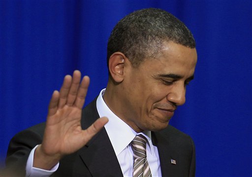 U.S President Barack Obama waves at the  Centro Cultural La Moneda Palace before his speech to Latin America in Santiago, Chile, Monday March 21, 2011. Obama is in Chile as part of a three-country, five-day tour of Latin America. (AP Photo/Roberto Candia) (AP)