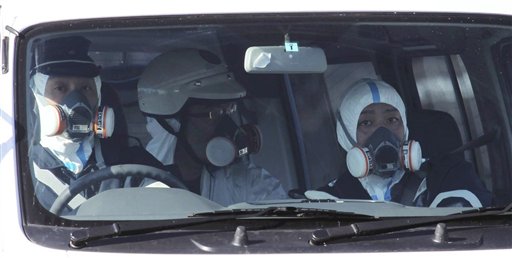 In this photo taken on Oct. 3, 2008, the Fukushima Daiichi Nuclear Power Plant in Okumamachi, Fukushima Prefecture, is seen. A strong earthquake on March 11, 2011 knocked out power at the plant, and because a backup generator failed, the cooling system was unable to supply water to cool the 460-megawatt No. 1 reactor, extreme right of four reactors sitting in a line in background. (AP Photo/Kyodo News)  MANDATORY CREDIT, NO LICENSING ALLOWED IN CHINA, HONG  KONG, JAPAN, SOUTH KOREA AND FRANCE (AP)