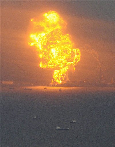 Flames rise from an oil refinery after a powerful earthquake in Ichihara, Chiba prefecture (state), Japan, Friday, March 11, 2011. The largest earthquake in Japan's recorded history slammed the eastern coast Friday. (AP Photo/Kyodo News) JAPAN OUT, MANDATORY CREDIT, FOR COMMERCIAL USE ONLY IN NORTH AMERICA (AP)