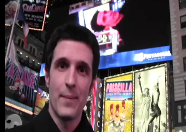 Another day, another guy controlling a giant screen from his cell phone.