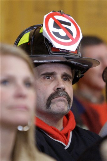 An opponent of Senate Bill 5 listens to the floor debate for the bill from the Senate chambers gallery Wednesday, March 2, 2011, in Columbus, Ohio. Senate Bill 5 would strip public employees of collective bargaining rights. (AP Photo/Jay LaPrete) (AP)