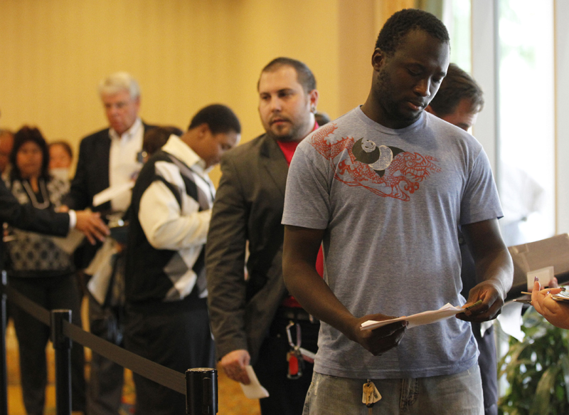 People wait in line to attend a job fair for military veterans and other unemployed people in Los Angeles, California, October 7, 2010.  REUTERS/Lucy Nicholson (UNITED STATES - Tags: EMPLOYMENT BUSINESS) (Â© Lucy Nicholson / Reuters)