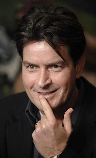 FILE - In this Jan. 28, 2009 file photo, actor Charlie Sheen is interviewed at an event to celebrate Planet Hollywood's purchase of Italian restaurant chain Buca di Beppo, at Universal CityWalk in Los Angeles. Sheen says Wednesday, March 2, 2011 that after his two young sons were removed from his house overnight, he's "very calm and focused" but ready to fight to get them back. Interviewed Wednesday live on NBC's "Today" show, Sheen confirmed the nearly 2-year-old twins, Bob and Max, were removed after a court order was granted to his estranged wife, Brooke Mueller, who is their mother. (AP Photo/Chris Pizzello, File) (AP)