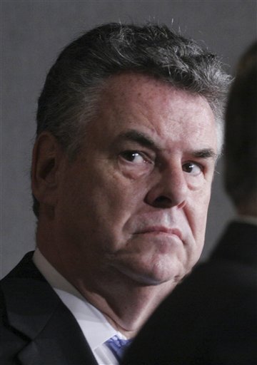 In this June, 2007 file photo, Rep. Peter King, R-N.Y., left, listens during a news conference on Capitol Hill in Washington. The wreckage of the World Trade Center still smoldered when George W. Bush rose to demand that American Muslims not be blamed or mistreated. "Islam is peace," the president declared. But a decade later, doubts and suspicions persist. New York Rep. Peter King is provocatively forcing the issue with congressional hearings, starting Thursday. (AP Photo/Lauren Victoria Burke) (AP)