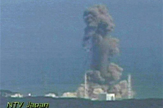 In this image made off Japan's NTV/NNN Japan television footage, smoke ascends from the Fukushima Dai-ichi nuclear plant's Unit 3 in Okumamachi, Fukushima Prefecture, northern Japan, Monday, March 14, 2011. The second hydrogen explosion in three days rocked Japan's stricken nuclear plant Monday, sending a massive column of smoke into the air and wounding 11 workers. (AP Photo/NTV/NNN Japan) MANDATORY CREDIT, JAPAN OUT, TV OUT, NO SALES, EDITORIAL USE ONLY (AP)