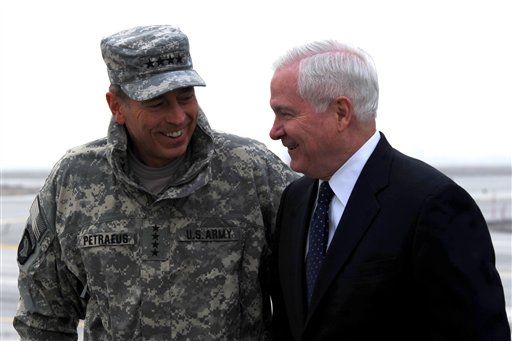 Defense Secretary Robert M. Gates, right, talks with Gen. David Petreaus upon his arrival in Kabul, Afghanistan, Monday March 7, 2011.  (AP Photo/Defense Department/Cherie Cullen) (AP)
