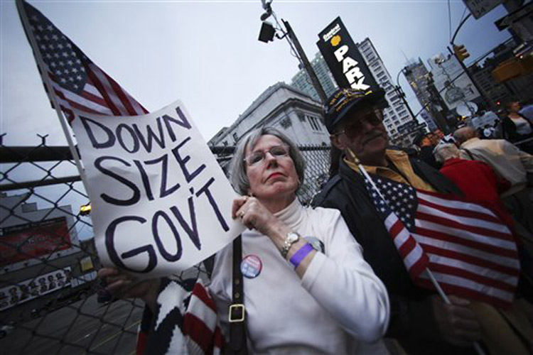 A couple participate in the Tax Day tea protest in New York, Thursday, April 15, 2010.  (AP Photo/Mary Altaffer) (Mary Altaffer)