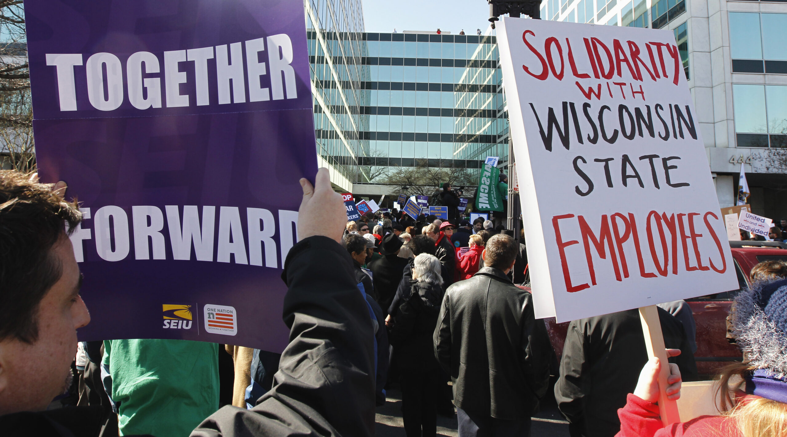 A group gathers in front of Wisconsin's lobbying offices, in Washington Wednesday, Feb. 23, 2011, in support of Wisconsin's workers. (AP Photo/Alex Brandon) (AP)