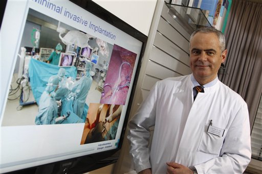 In this Friday, Feb. 25, 2011 photo Thomas Horbach, chief of surgery at Stadtkrankenhaus Schwabach, who led one of the trials, is seen in his office in the hospital in Schwabach, near Nuremberg, Germany,  Horbach implanted a stomach pacemaker that helps regulate the amount of food users take in. Patrick Hetzner, a 20-year-old Munich mailman, has knocked off more than 10 kilos (22 pounds) from his earlier weight of 104 kilos (229 pounds).  (AP Photo/Carolin Deutsch) (AP)