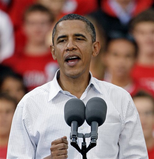 File - In this Sept. 28, 2010, file photo President Barack Obama speaks to a rally at the University of Wisconsin in Madison, Wis.  Few states handed Democrats bigger losses in the midterm elections than Wisconsin, even though President Obama campaigned actively there. But the president will be back again Wednesday, this time to road-test the themes from his State of the Union message. (AP Photo/Morry Gash, File) (AP)