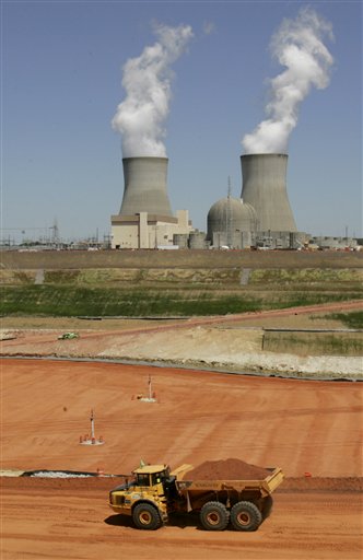 FILE - In this file photo taken April 28, 2010, work continues to excavate what could become the foundation for a new nuclear power plant near the existing  nuclear reactors at Plant Vogtle, shown in the background  in Waynesboro, Ga. The images of exploding nuclear facilities in Japan could deal a setback to nuclear power as a clean-energy alternative in the United States. (AP Photo/Mary Ann Chastain, file) (AP)