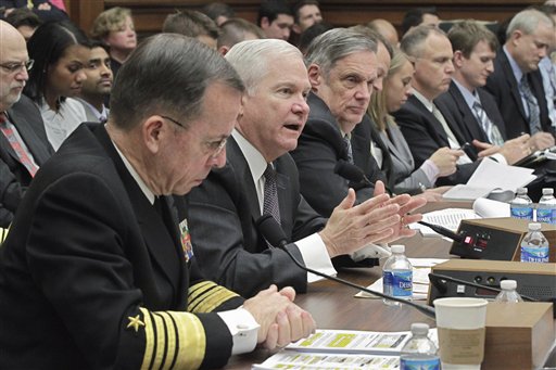 From left, Joint Chiefs Chairman Adm. Michael Mullen; Defense Secretary Robert Gates; Pentagon Comptroller Robert F. Hale, and others, testify on Capitol Hill in Washington, Wednesday, Feb. 16, 2011, before the HouseArmed Services Committee hearing on the Defense Department's budget. (AP Photo/J. Scott Applewhite) (AP)