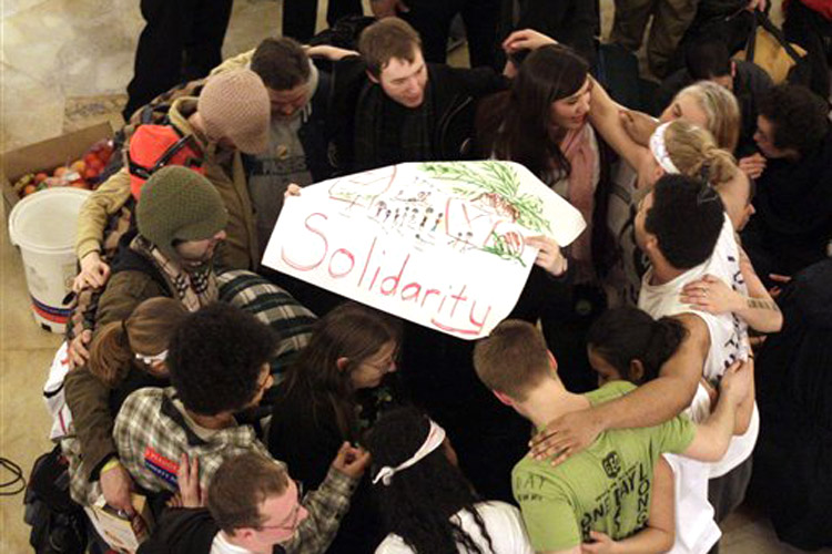 Protesters celebrate inside of the state Capitol in Madison, Wis., Thursday, March 3, 2011, after a judge ordered the Department of Administration to open the Capitol to normal business hours starting Monday, March 7, 2011.  (AP Photo/Andy Manis) (Andy Manis)