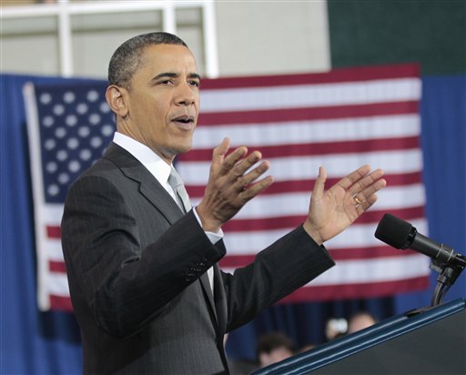 President Barack Obama gestures during his speech at Kenmore Middle School in Arlington, Va., Monday, March, 14, 2011. (AP Photo) (AP)