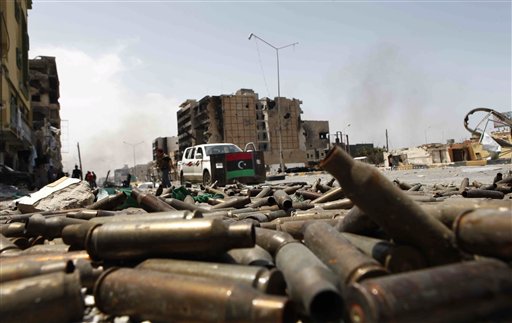 Bullet casings litter a street in the besieged city of Misrata, Libya, Saturday, April 23, 2011. Government troops retreated to the outskirts of Misrata under rebel fire Saturday and the opposition claimed victory after officials in Tripoli decided to pull back forces loyal to Moammar Gadhafi following nearly two months of laying siege to the western city. (AP Photo) (AP)