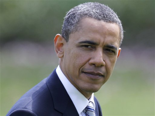 President Barack Obama returns to the White House in Washington, Friday, April 15, 2011, after a trip to Chicago. (AP Photo/Charles Dharapak) (AP)
