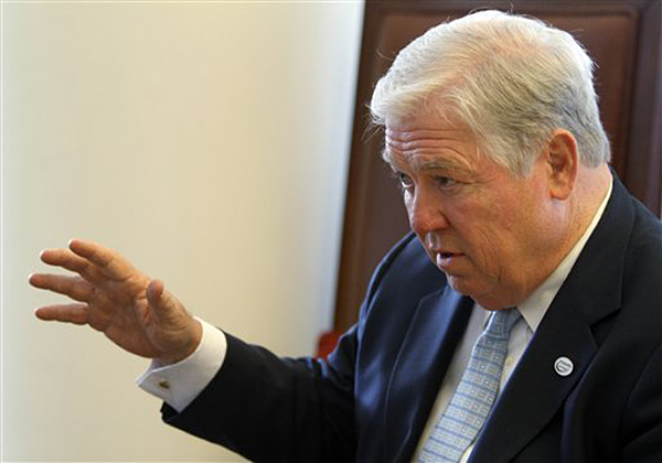 Mississippi Gov. Haley Barbour talks with a reporter in the lobby of the Hyatt after speaking to a group of coal operators in Lexington, Ky., on Thursday, Feb. 17, 2011. (AP Photo/ James Crisp) (James Crisp)
