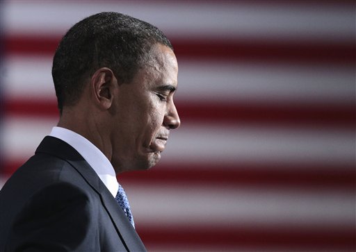 President Barack Obama pauses while speaking during his visit to a UPS shipping facility in Landover, Md., Friday, April 1, 2011. (AP Photo/Pablo Martinez Monsivais) (AP)