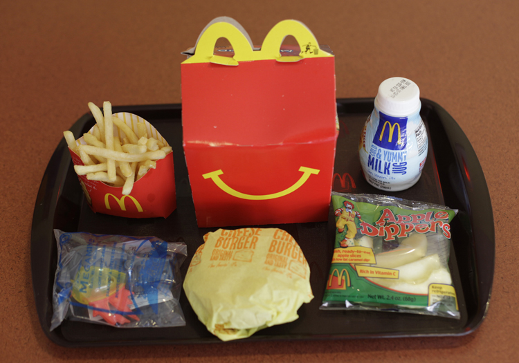 Shown is a Happy Meal at a McDonald's restaurant in San Francisco, Monday, Nov. 8, 2010. In the left foreground is a character toy included with the meal from the movie Megamind. It is a happy moment for people who see the Happy Meal as anything but.  San Francisco is poised to become the first major American city to require fast-food restaurants to sell meals that meet set nutritional guidelines or not include a toy with them. (AP Photo/Eric Risberg) (Eric Risberg)