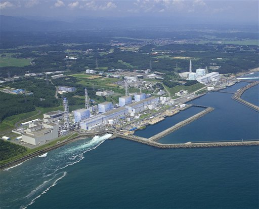 FILE - In this undated file photo released by Tokyo Electric Power Co., the Fukushima Daiichi Nuclear Power Plant reactors stand in line intact in Okuma town in Fukushima Prefecture, northeastern Japan. Radiation has covered the area around the Fukushima Dai-ichi plant and blanketed parts of the complex, making the job of rendering the plant safe so that it doesn't threaten public health and the environment, or "decommissioning", a bigger task than usual. (AP Photo/Tokyo Electric Power Co.,File) (AP)