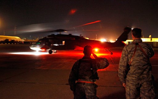 A Blackhawk helicopter with U.S. Defense Secretary Robert Gates and U.S. Army Gen. Lloyd Austin, commanding general of U.S. Forces in Iraq, on board taxis on the tarmac after Gates' arrival Wednesday, April 6, 2011 in Baghad, Iraq. (AP Photo/Chip Somodevilla, Pool) (AP)