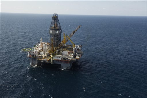 FILE - In this Sept. 18, 2010 file photo, the Development Driller III, which drilled the relief well and pumped the cement to seal the Macondo well, the source of the Deepwater Horizon rig explosion and oil spill, is seen in the Gulf Of Mexico, off the coast of Louisiana. More than 3,200 oil and gas wells classified as active lie abandoned beneath the Gulf of Mexico with none of the cement plugging normally required to help keep unused wells from leaking, threatening the same waters fouled by last year's BP oil spill, The Associated Press has learned. (AP Photo/Gerald Herbert, File) (AP)