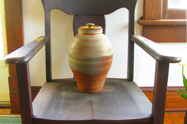 The vase that holds the ashes of the author's son