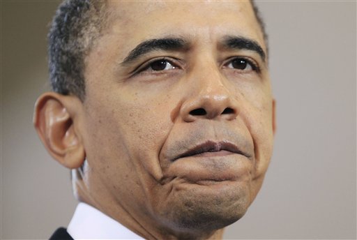 President Barack Obama pauses during his speech on America's energy security, in this photo taken Wednesday, March 30, 2011, at McDonough at Gymnasium Georgetown University in Washington. Americans grew increasingly pessimistic about the economy over the past month as soaring gas costs further strained tight family budgets.  (AP Photo/Pablo Martinez Monsivais) (AP)