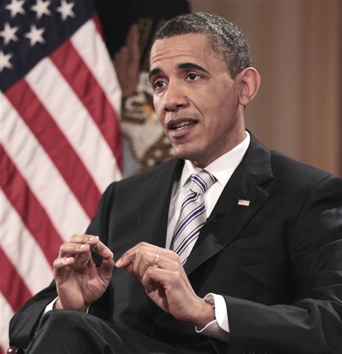 President Barack Obama gestures during his interview with The Associated Press, Friday, April 15, 2011, in Chicago. (AP Photo/Pablo Martinez Monsivais) (AP)