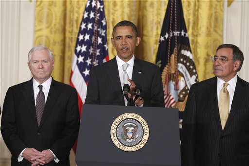 President Barack Obama stands with outgoing Defense Secretary Robert Gates, left, and Defense Secretary-nominee Leon Panetta, in the East Room of the White House in Washington, Thursday, April 28, 2011, as he introduced his reworked reworked national security team . (AP Photo/Charles Dharapak) (AP)