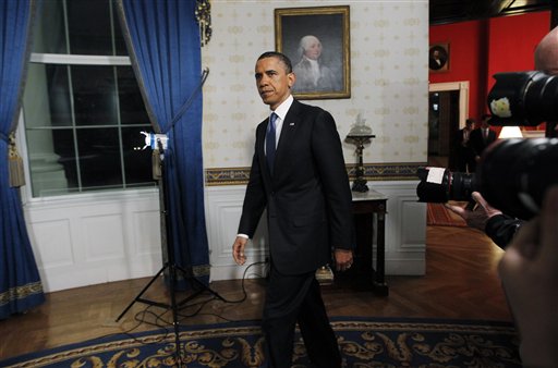 President Obama returns to the Blue Room at the White House in Washington after he spoke regarding the budget and averted government shutdown, Friday, April 8, 2011. (AP Photo/Charles Dharapak) (AP)