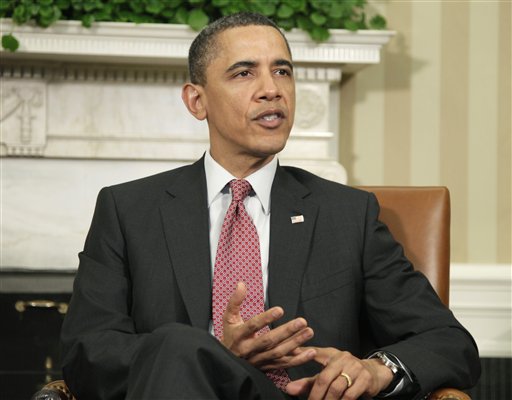 President Barack Obama speaks in the Oval Office of the White House in Washington, Thursday, April 14, 2011, while meeting the the co-chairmen of his deficit reduction commission.  (AP Photo/Carolyn Kaster) (AP)