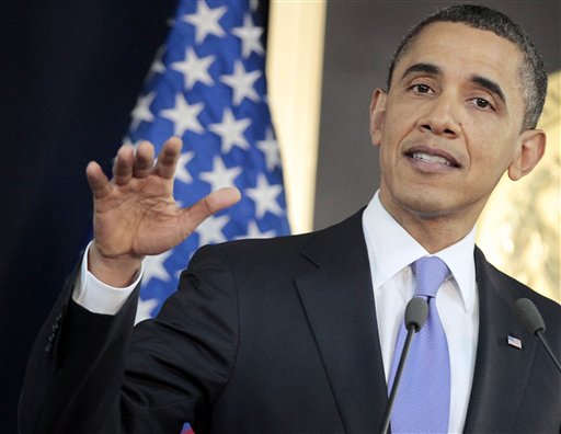 President Barack Obama answers a question on the ongoing situation in Libya during his joint news conference with President of El Salvador Mauricio Funes at the National Palace in San Salvador, El Salvador, Tuesday, March 22, 2011. (AP Photo/Pablo Martinez Monsivais) (AP)