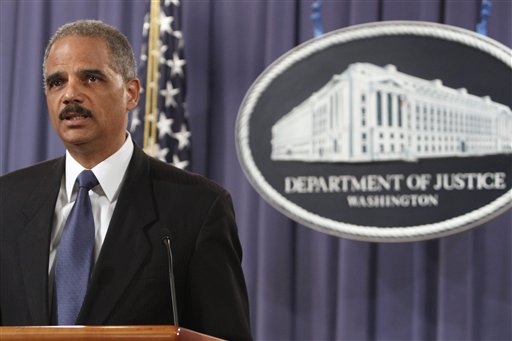 Attorney General Eric Holder speaks at a news conference at the Justice Department in Washington, Monday, April 4, 2011, where he announced plans to try avowed 9/11 mastermind Khalid Sheikh Mohammed and four alleged henchmen before a military commission.  (AP Photo/Jacquelyn Martin) (AP)