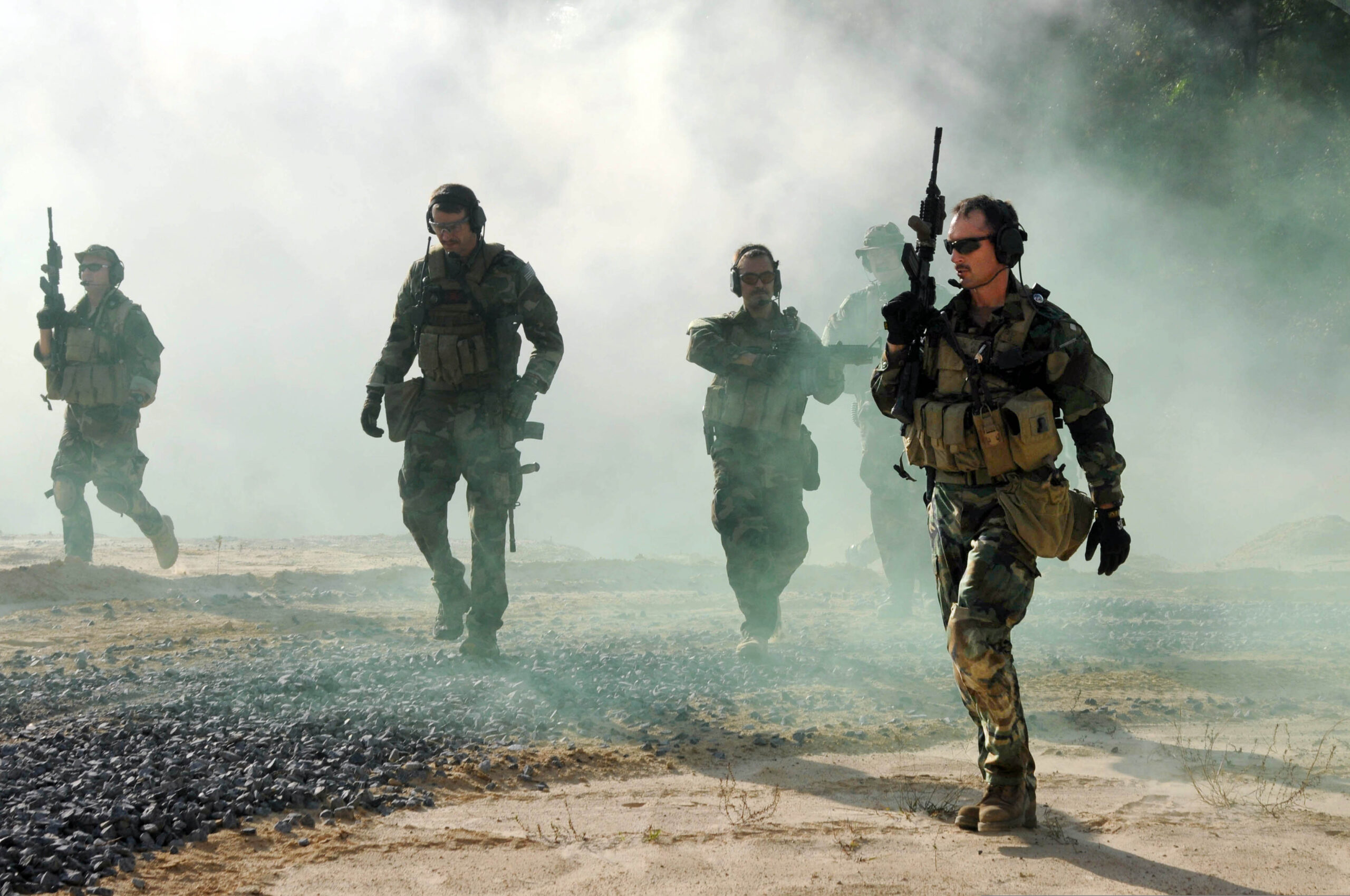U.S. Navy SEALs conduct immediate action drills during predeployment training at the John C. Stennis Space Center in Mississippi Oct. 25, 2010. Navy SEALs are the maritime component of U.S. Special Operations Command and are trained to conduct a variety of operations from the sea, air and land. (U.S. Navy photo by Mass Communication Specialist 2nd Class John Scorza/Released) (Mass Communication Specialist 2n)