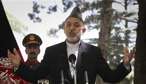 Afghan President Hamid Karzai gestures during a press conference at the presidential palace in Kabul, Afghanistan on Tuesday, May 31, 2011. Angered by civilian casualties, Karzai said Tuesday he will no longer allow NATO airstrikes on houses, issuing his strongest statement yet against strikes that the military alliance says are key to its war on Taliban insurgents. (AP Photo/Musadeq Sadeq) (AP)