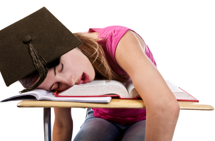A student fast asleep on her school work. (Sharon Dominick)