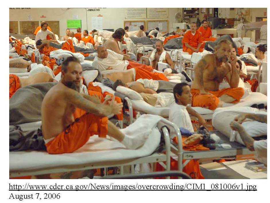 An exhibit from Plata v. Brown showing male prisoners in an overcrowded California facility.