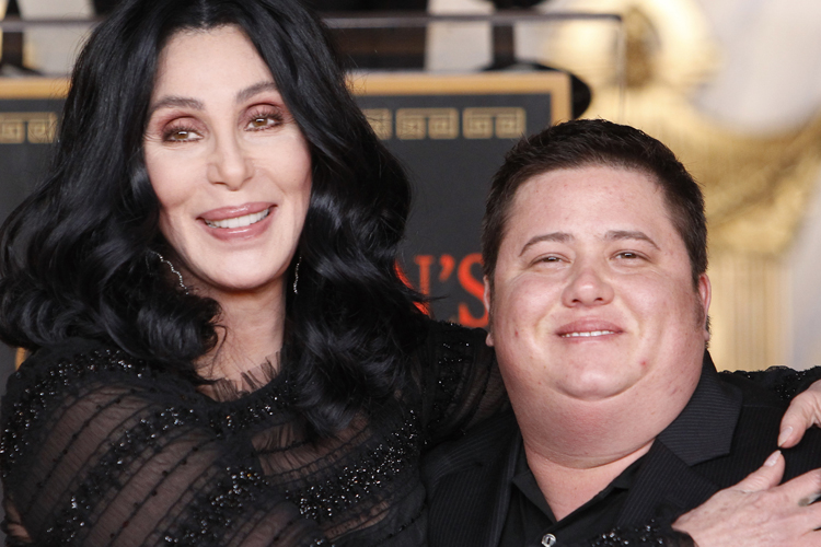 Cher poses with her son Chaz Bono during her hand and footprint ceremony in the forecourt of the Grauman's Chinese Theatre in Hollywood, California November 18, 2010. REUTERS/Danny Moloshok (UNITED STATES - Tags: ENTERTAINMENT) (Danny Moloshok)