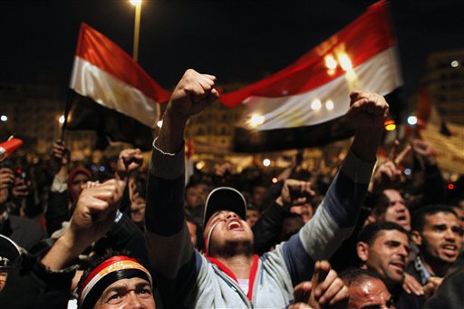 FILE - In this Feb. 10, 2011 file photo, anti-government protesters demonstrate in Tahrir Square in downtown Cairo, Egypt. Osama bin Laden and his jihadi rhetoric once resonated with millions, especially those in the Arab world who saw militant Islam as their best hope for throwing off the shackles of corrupt, oppressive governments. But 10 years after 9/11, the dominant theme in the uprisings across the Middle East is a clamor for democracy _ with al-Qaida's militant ideology largely relegated to the sidelines. (AP Photo/Tara Todras-Whitehill, File) (AP)