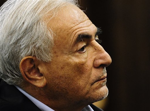 Dominique Strauss-Kahn, head of the International Monetary Fund, is arraigned Monday, May 16, 2011, at Manhattan Criminal Court in New York, on charges he sexually assaulted a hotel maid on Saturday. Strauss-Kahn must remain jailed at least until his next court hearing for attempted rape and other charges, a judge said Monday. (AP Photo/Emmanuel Dunand, Pool) (AP)